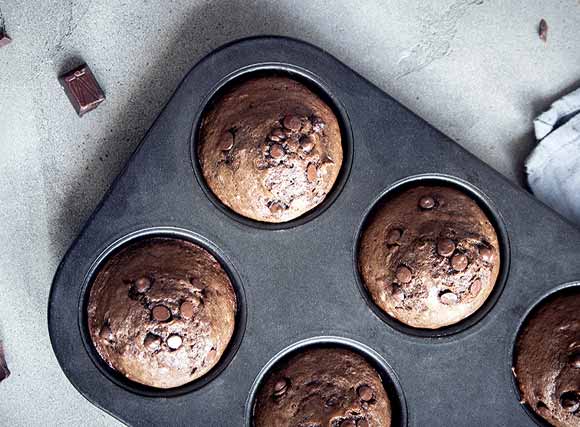 Baking tray with chocolate muffins