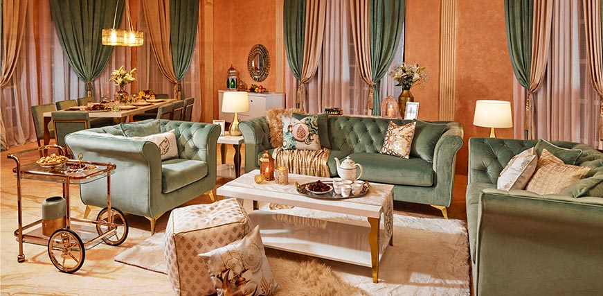 glam gold Ramadan decor with velvet sofas