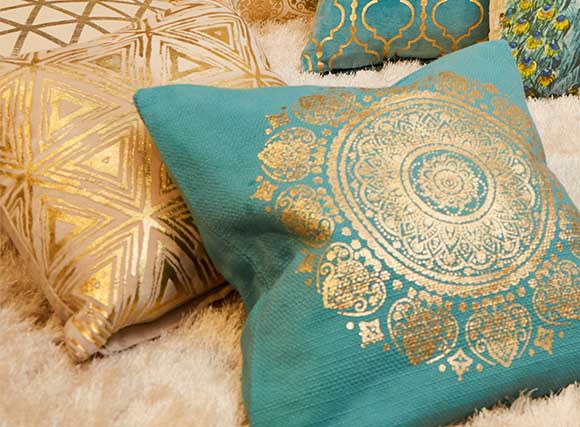 Turquoise medallion print cushion 